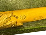 a baseball bat that is sitting in a box