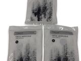 three bags of air freshener sitting on top of each other