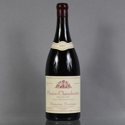 a bottle of wine that is sitting on a table