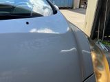 a close up of a car door handle with a mirror on it