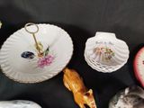 a lot of small dishes that are sitting on a table