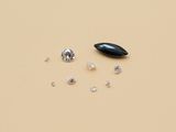 three different types of diamonds on a yellow surface