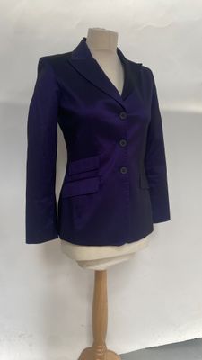 purple blazer jacket on a mannequin display on a white background