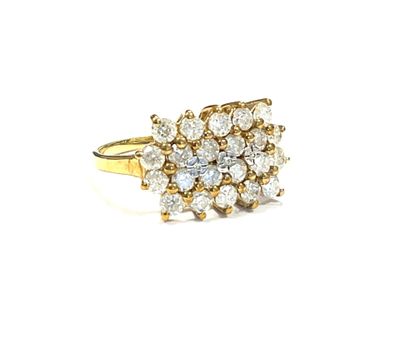 a close up of a diamond ring on a white background