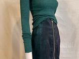 green sweater and black skirt on mannequin mannequin mannequin mannequin mannequin mannequin mannequin mannequin manne