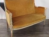 an image of a couch in a room with wood floors