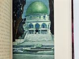 an open book with a picture of a green dome on it