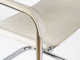 the chair is made of leather and has a metal frame