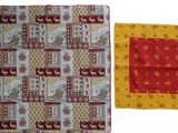 two pieces of cloth that are on a white surface