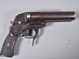 a gun that is sitting on a table
