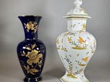 two vases sitting next to each other on a table