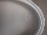 a close up of a toilet bowl with the lid down