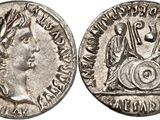 a silver coin with an image of a woman on it