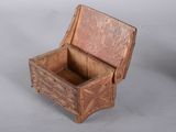 a small wooden box that is sitting on a table
