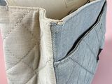 an image of a purse made out of a piece of fabric