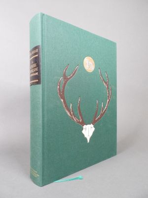 the book is green and has a deer ' s head on it