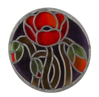 une image représentant une rose en vitrail dans un cercle