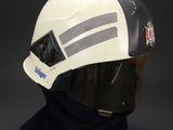 an image of a helmet with a visor on a black background