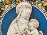 a picture of a statue of a woman holding a child