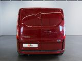 an image of a red van parked in a garage