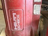 a red machine that is sitting on a table