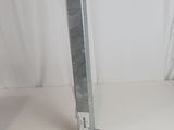 a metal pole that is on a white surface