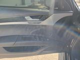 a car door with the sun shining through the window
