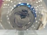 a bottle of water that is sitting on top of a table