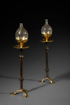 pair of brass and glass candlesticks