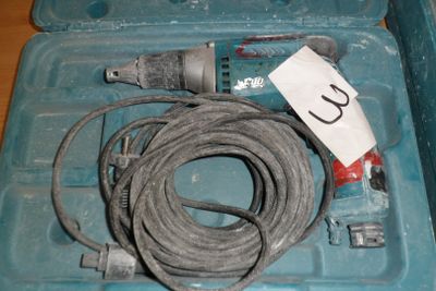 a cord in a tool box with a cord in it