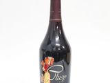 an image of a bottle of wine sitting on top of a table