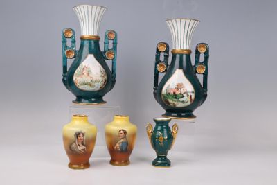 three vases that are sitting next to each other on a table