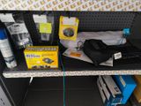 a lot of items on the shelf in the store