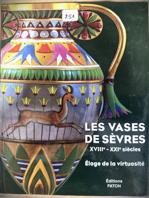 a picture of a book with a picture of a vase on it