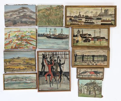 a lot of paintings hanging on the wall of a room