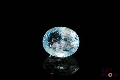 an image of a blue diamond on a black surface