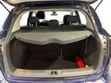 a trunk of a car with the back seats folded down