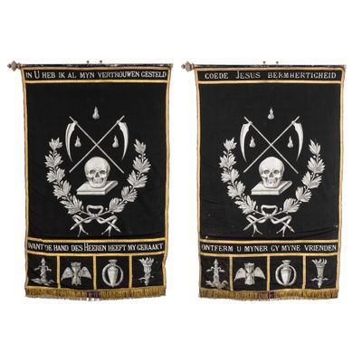two black and white banners with a skull and cross on them