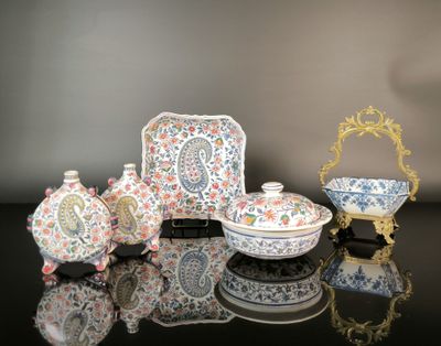 a lot of different pieces of porcelain on a table