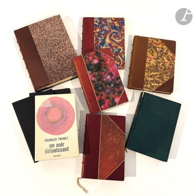 many different types of books on a white surface