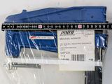 a plastic ruler and a plastic case on a white surface
