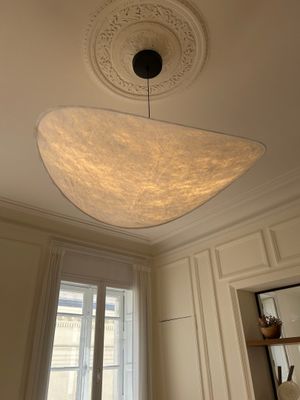 a light that is hanging from the ceiling in a room