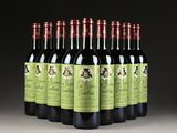 six bottles of red wine are lined up in a row