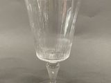 a glass that is sitting on a table