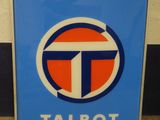 a sign that says talbot on the side of a wall