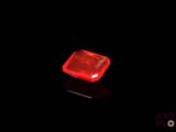 an image of a red light in the dark