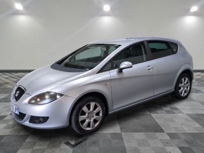 a picture of a silver car on a checkered floor