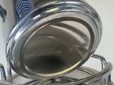 a pot and pan sitting on top of a stove