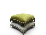 a close up of three pillows on top of each other