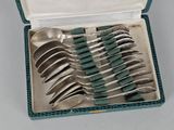 a box with a set of spoons and spoons in it